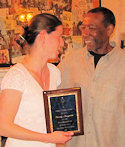 Wendy Marszalek (receiving James Moore Award from James)