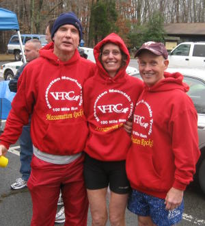 Anstr, Vicki, and Gary are in uniform at post run festivities