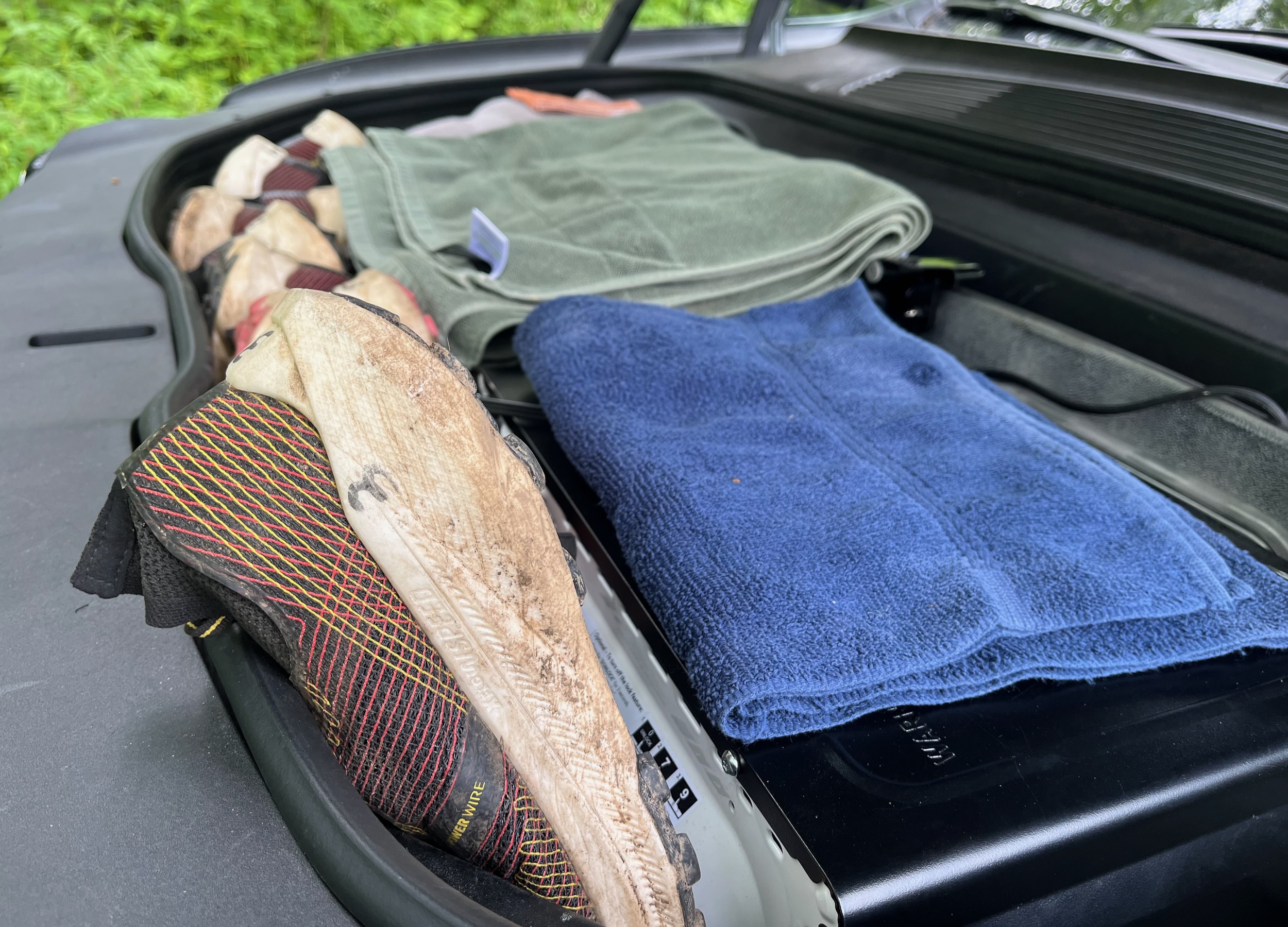 John's shoes lined up in his crew vehicle