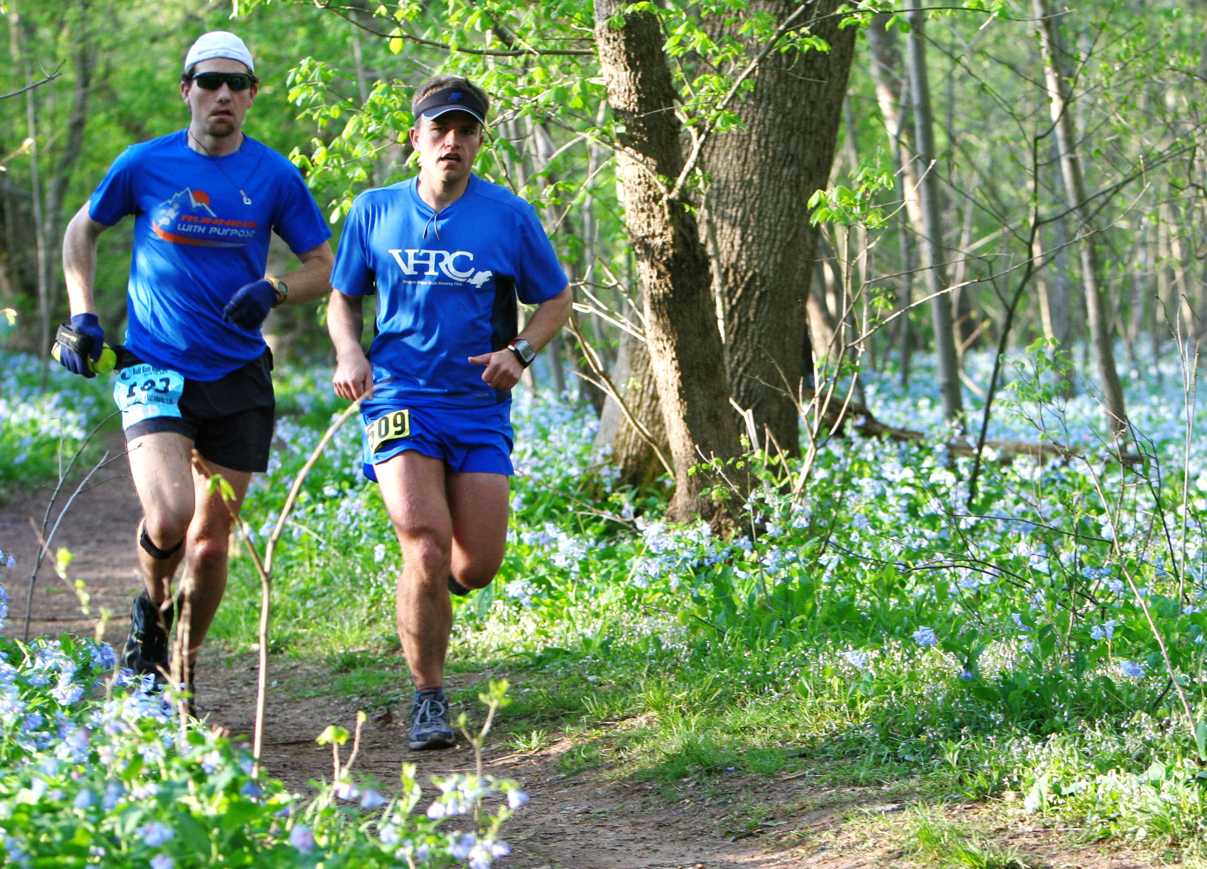 Brad Hinton and Keith Knipling cruise through the bluebells during the early miles of the 2010 BRR.