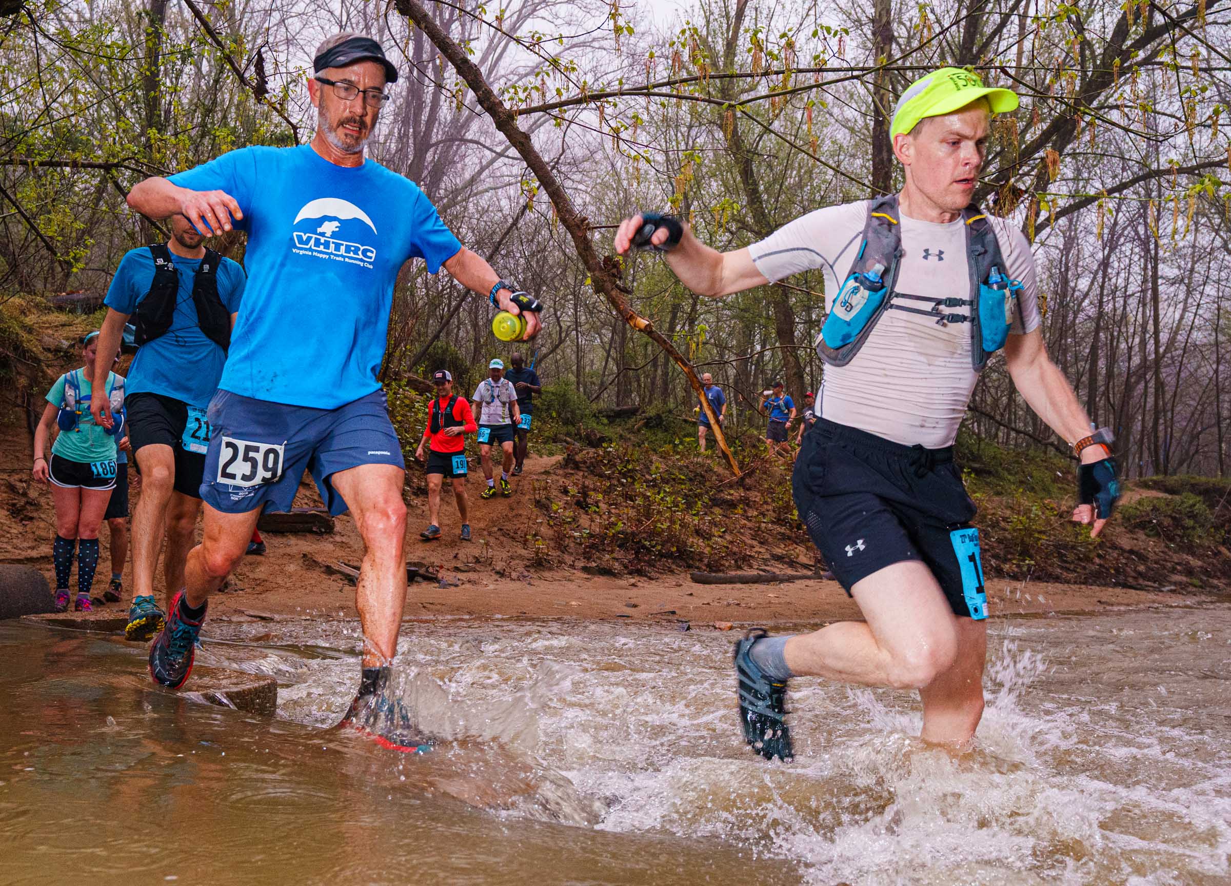 Runners crossing Popes Head Creek during the early miles of the 2019 BRR