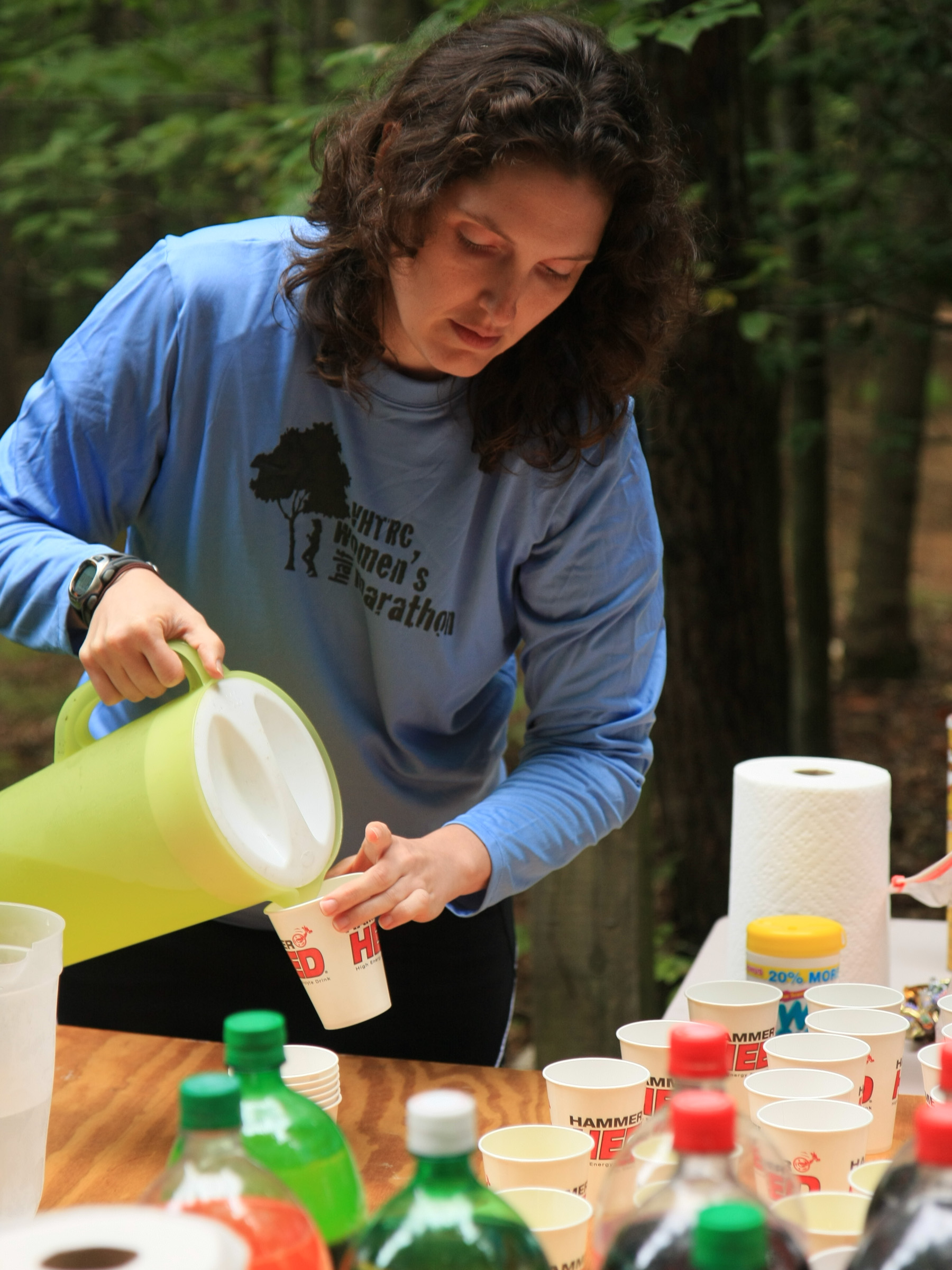 Energy drink, soda, light snacks — a typical aid station at the Women’s Half Marathon