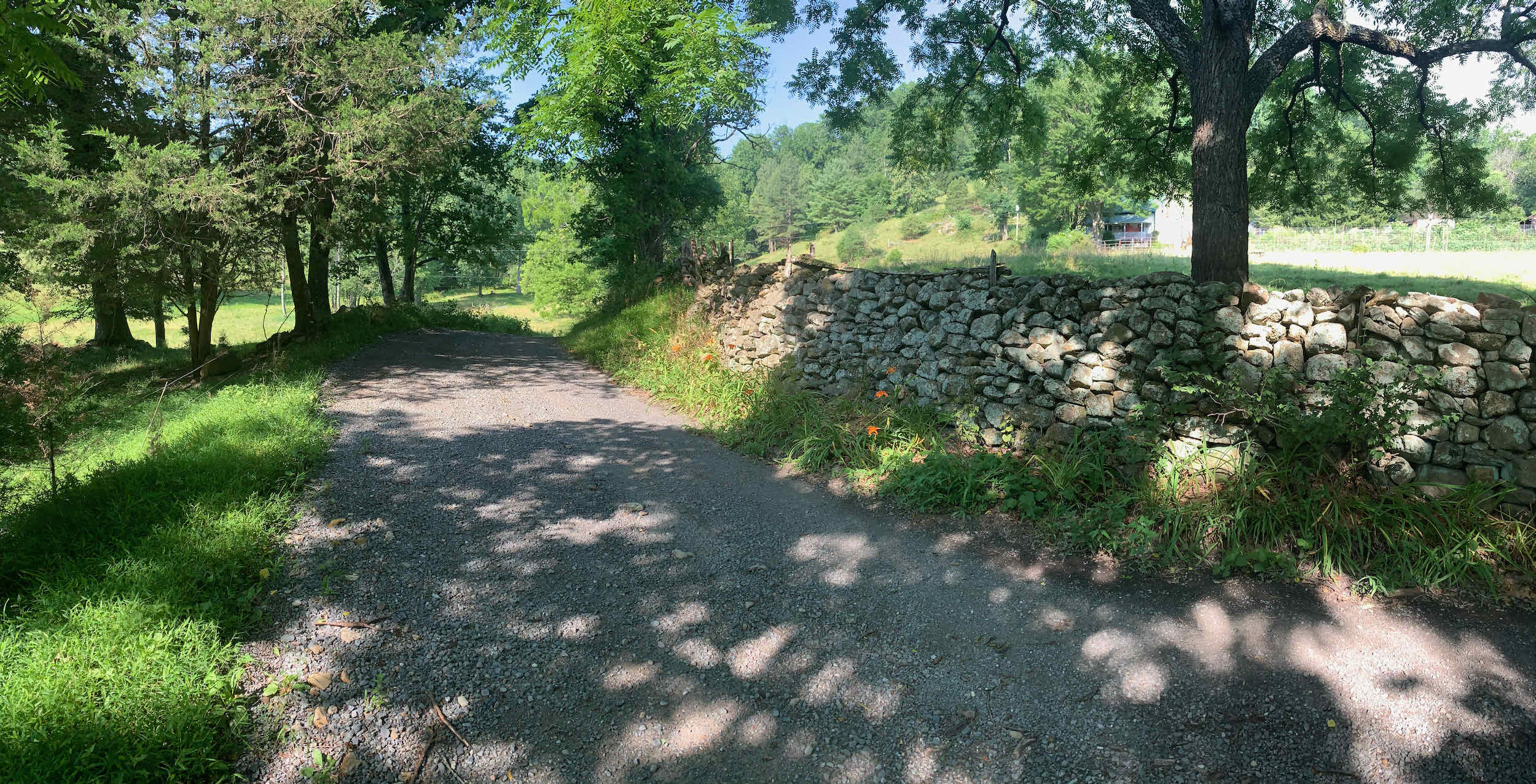 Passing old homesteads and stone walls along Rolling Road
